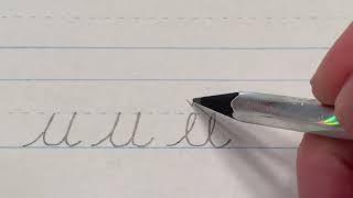 Lowercase quotuquot in cursive [upl. by Auqkinahs]