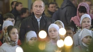 Putin attends Russian Orthodox Christmas Eve Mass [upl. by Martz]