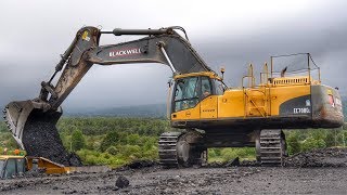 Volvo EC700C Excavator Loading Trucks [upl. by Aketal799]