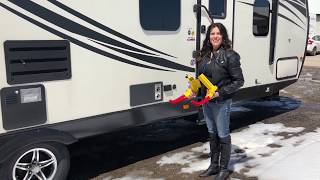 CampOut RV  Demonstrating the Trimax Wheel Chock Lock [upl. by Saunders864]