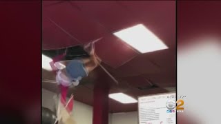 Woman Falls Through Restaurant Ceiling [upl. by Manaker910]