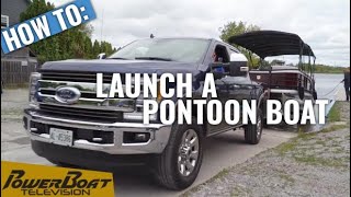 How to Launch a Pontoon Boat  PowerBoat Television Boating Tips [upl. by Ayanad]