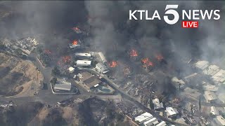 Brush Fire Engulfs Mobile Home Park Near Calimesa California [upl. by Esimorp]