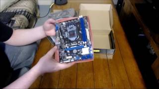 Unboxing ASRock H61MDGS R20 [upl. by Yamauchi]